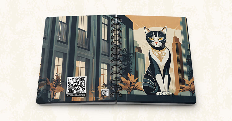 Person holds a "My Urban Backyard" Spiral Journal