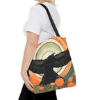 Person holding a tote bag with a black crow bird design by My Urban Backyard, on a white background