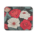 Picnic blanket with Floral design with red, white, and green flowers on a black background